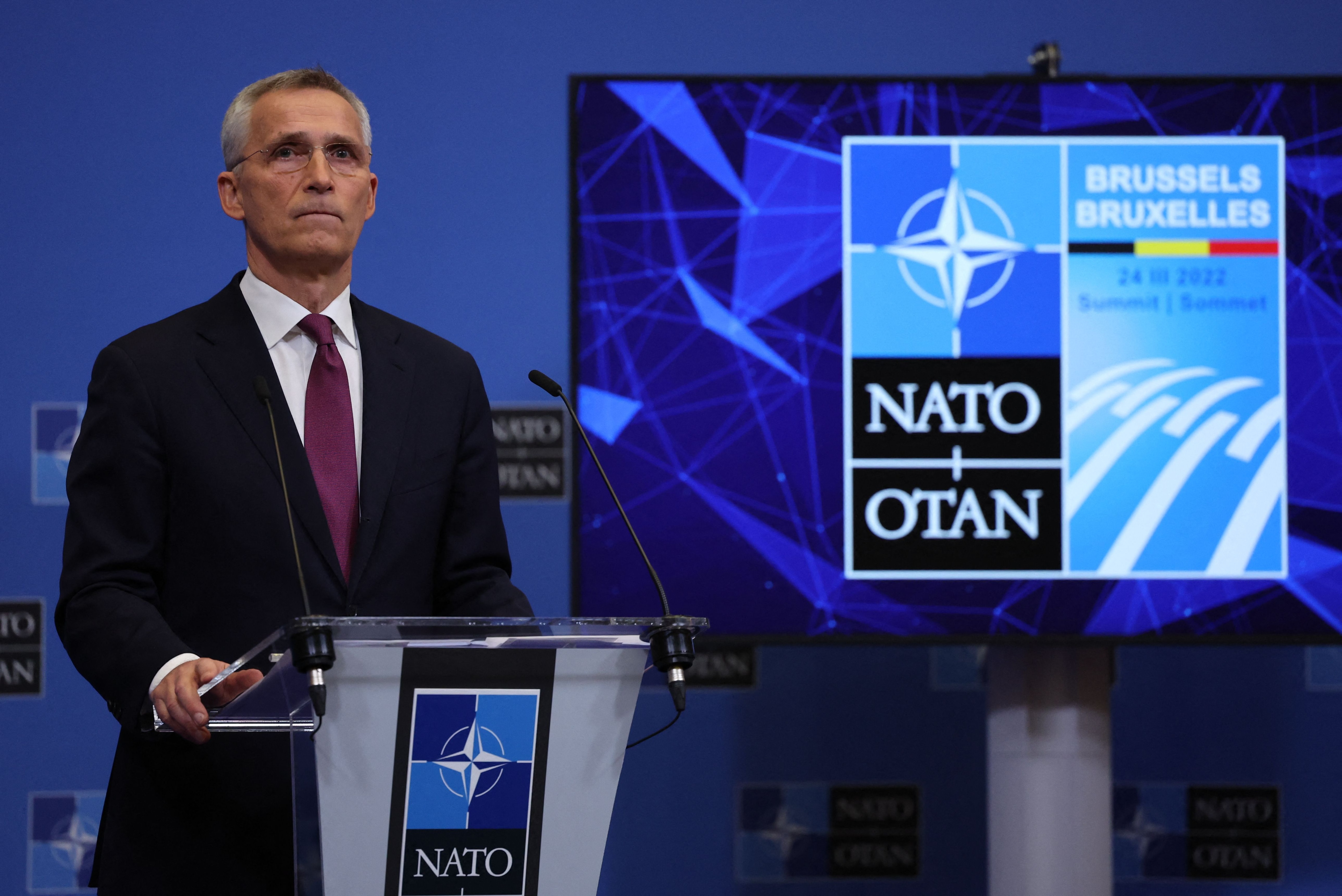 NATO Secretary General Jens Stoltenberg addresses a press conference at NATO Headquarters in Brussels on March 23, 2022. (Photo by Thomas COEX / AFP)